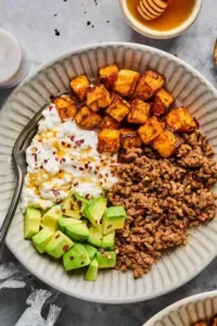 viral cottage cheese taco bowl with sweet potatoes and beef